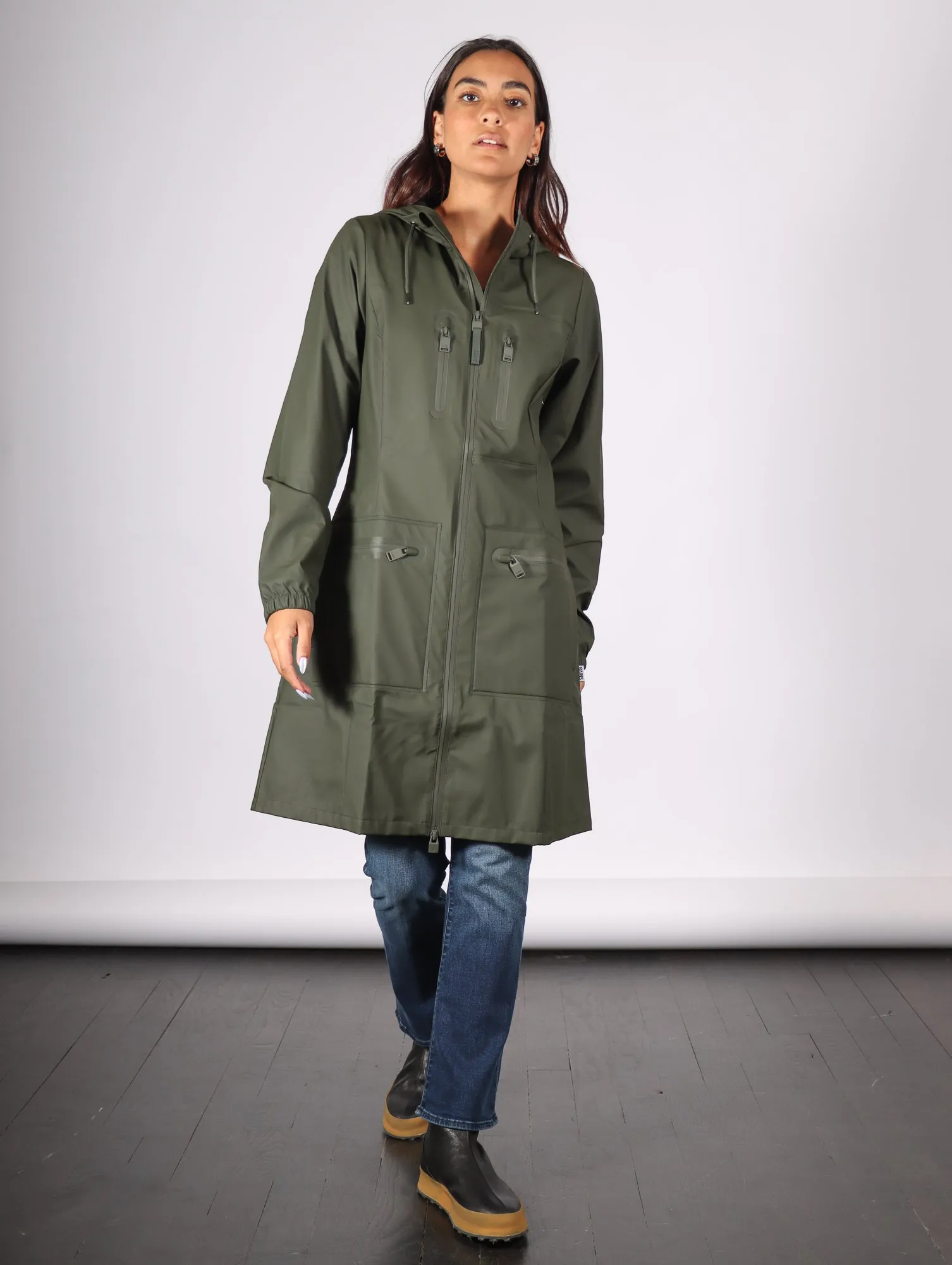 Cargo Curve W Jacket in Green by RAINS